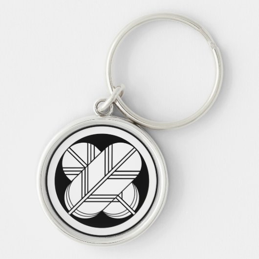 Porte-clés Intersecting hawk feathers with foot in circle (Devant)