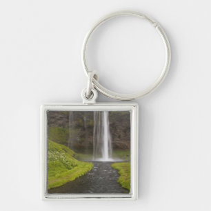 Porte-clés Islande. Personnes sur le sentier derrière Seljala