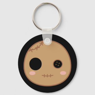 Porte-clés Itami la tête de poupée de vaudou
