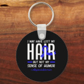 Porte-clés J'Ai Peut-Être Perdu Mes Cheveux Mais Pas Mon Humo (Verso)