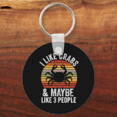 Porte-clés J'Aime Les Crabes Et Peut-Être 3 Personnes Chasse  (Recto)