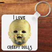 Porte-clés J'Aime Poupées Déplaisantes - Tête de poupée (Verso)