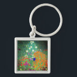 Porte-clés Jardin aux fleurs Gustav Klimt<br><div class="desc">Porte - clé avec la peinture à l’huile de Gustav Klimt Jardin aux fleurs (1906). Un beau jardin de fleurs violettes,  rouges,  blanches,  bleues et oranges. Un grand cadeau pour les amateurs d'art Art Nouveau et autrichien.</div>