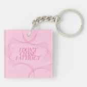 Porte-clés Je n'attrape pas, j'attire Citation, Rose (Dos)