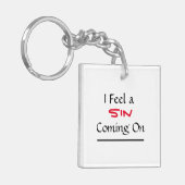 Porte-clés "Je Sens Qu'Un Péché Arrive" Phrase (Devant gauche)