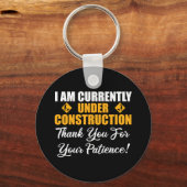 Porte-clés Je Suis Actuellement En Construction (Recto)