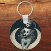 Porte-clés Jester sits on crescent moon wireless charger  (Verso)