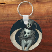 Porte-clés Jester sits on crescent moon wireless charger  (Recto)