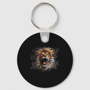 Porte-clés Jésus Christ est roi avec le lion frappant de Juda
