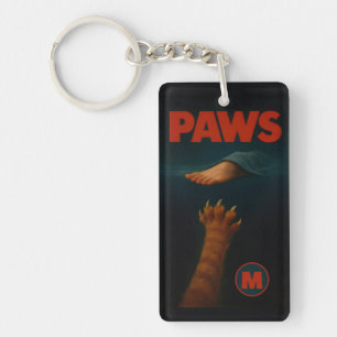 Porte-clés Joli chat tigré orange contre pied humain