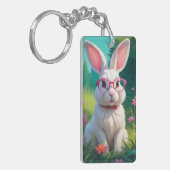 Porte-clés Joli lapin blanc assis sur de l'herbe verte (Devant gauche)