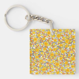 Porte-clés Joli orange jaune fleurs blanches motif