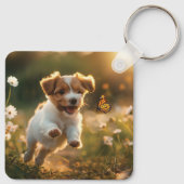 Porte-clés Joli petit chiot à la recherche d'un papillon (Dos)