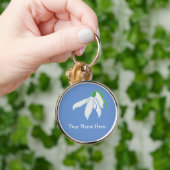 Porte-clés Jolie fleur blanche de neige sur bleu (Main)