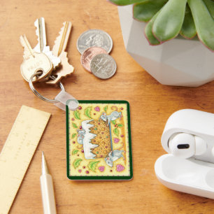 Porte-clés Jolis souris de Noël portant un dessert de gâteau 