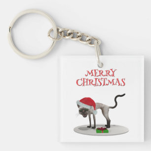 Porte-clés Joyeux Noël. Chat avec chapeau de Père Noël