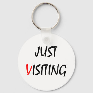 Porte-clés Juste visitant