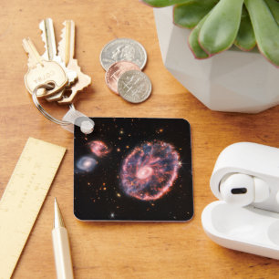 Porte-clés La Galaxie Cartwheel Et Ses Galaxies Compagnons.