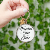 Porte-clés La liberté face à la peur (Main)