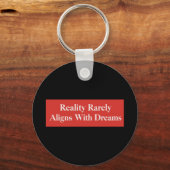 Porte-clés La Réalité S'Aligne Rarement Aux Rêves (Verso)