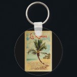Porte-clés La Romana Palm Tree Vintage voyage<br><div class="desc">Un imprimé d'art moderne et rétro unique de la République Dominicaine La Romana dans un style d'affiche de voyage vintage. Il dispose d'un palmier incurvé sur une plage de sable avec l'océan sous un ciel bleu nuageux.</div>