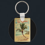 Porte-clés La Romana Palm Tree Vintage voyage<br><div class="desc">Un imprimé d'art moderne et rétro unique de la République Dominicaine La Romana dans un style d'affiche de voyage vintage. Il dispose d'un palmier incurvé sur une plage de sable avec l'océan sous un ciel bleu nuageux.</div>