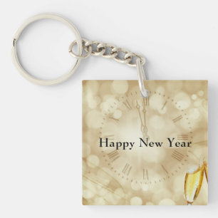 Porte-clés La Saint-Sylvestre avec des verres de champagne