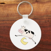 Porte-clés La vache saute par-dessus des T-shirts et des cade (Recto)