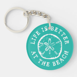 Porte-clés La vie est meilleure à la plage sable $ coquillage
