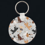 Porte-clés Labradoodle / Goldendoodle Bones and Paws Porte -<br><div class="desc">Cute Labradoodle / Les chiens Goldendoodle s'assoient et se tiennent et se retournent avec crème,  abricot,  chocolat,  manteaux noirs et à parti avec des os de chien éparpillés et des motifs de pawprints.</div>