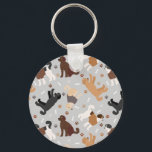 Porte-clés Labradoodle / Goldendoodle Bones and Paws Porte -<br><div class="desc">Cute Labradoodle / Les chiens Goldendoodle s'assoient et se tiennent et se retournent avec crème,  abricot,  chocolat,  manteaux noirs et à parti avec des os de chien éparpillés et des motifs de pawprints.</div>