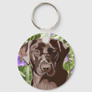 Porte-clés Labrador Brown Chocolat devant des Jacinthes