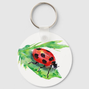 Porte-clés Ladybug sur la feuille verte