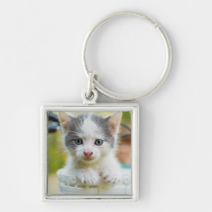Porte-clés Le chaton monte un vélo