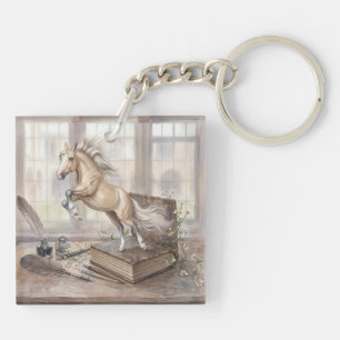 Porte-clés Le cheval savant bondissant d'un livre