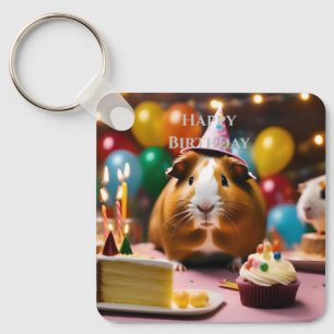 Porte-clés Le Cochon De Guinée Fête Avec Du Gâteau Et Du Boul