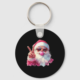 Porte-clés Le Père Noël souffle la bulle gomme rose Sungels C