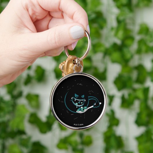 Porte-clés Le trou noir dévore (Main)