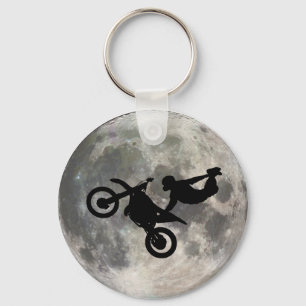 Porte-clés Le vélo sauté au-dessus de la lune