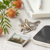 Porte-clés Les émigrants (Côté)