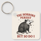 Porte-clés Les Horreurs Persistent Mais Moi Aussi (Recto)