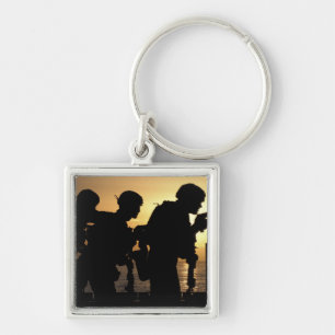 Porte-clés Les marines mettent le feu à des pistolets de 9mm