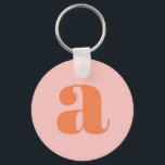 PORTE-CLÉS LETTRE MONOGRAPHIQUE CONSTRUITE INITIALE PÂLE ROSE<br><div class="desc">Joli porte - clé avec monogramme moderne en rose pastel et orange.</div>
