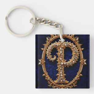 Porte-clés Lettre 'P' dorée ornée sur velours élégant