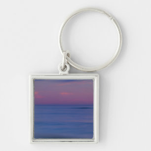 Porte-clés Lever de soleil violet sur la côte océanique