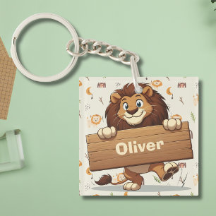 Porte-clés Lion joueur avec plaque de nom en bois