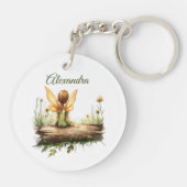 Porte-clés Lonely Fairy assis sur un journal (Dos)