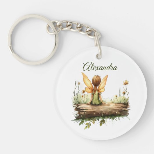 Porte-clés Lonely Fairy assis sur un journal (Devant)