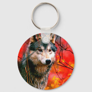 Porte-clés Loup à travers les feuilles dans une forêt