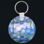 Porte-clés Lys d'eau rose Monet<br><div class="desc">Un porte - clé Monet rose nénuphars bouton avec de belles nénuphars roses flottant dans un étang bleu calme avec des nénuphars. Un grand cadeau Monet pour les amateurs d'impressionnisme et d'art français. Impressionnisme nature serein avec de belles fleurs et paysage d'étang pittoresque.</div>